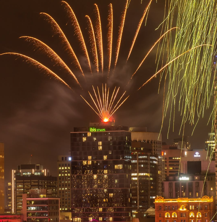 Fireworks coming from the rooftop of Ibis Styles Brisbane, Elizabeth Street